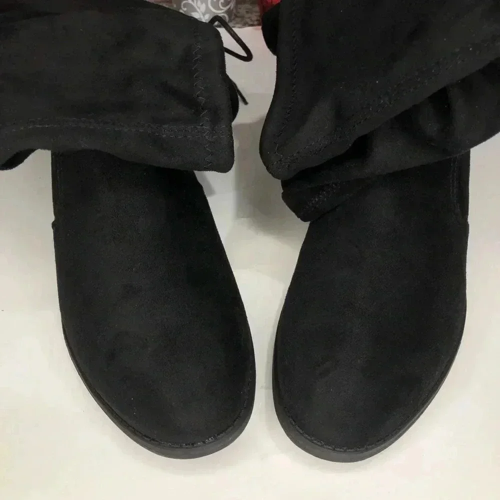 Over the knee stretch boots